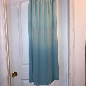 Long skirt. Teal color. Size:S See through.